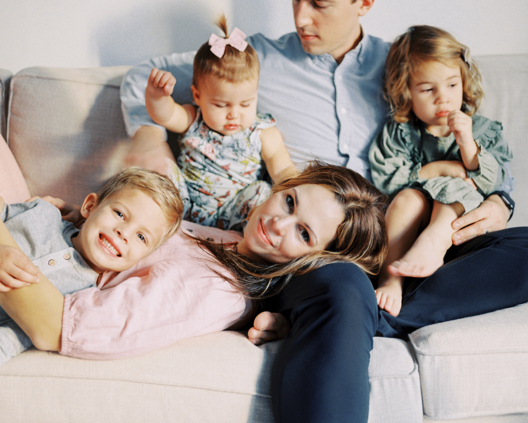 Jane with her family on the couch