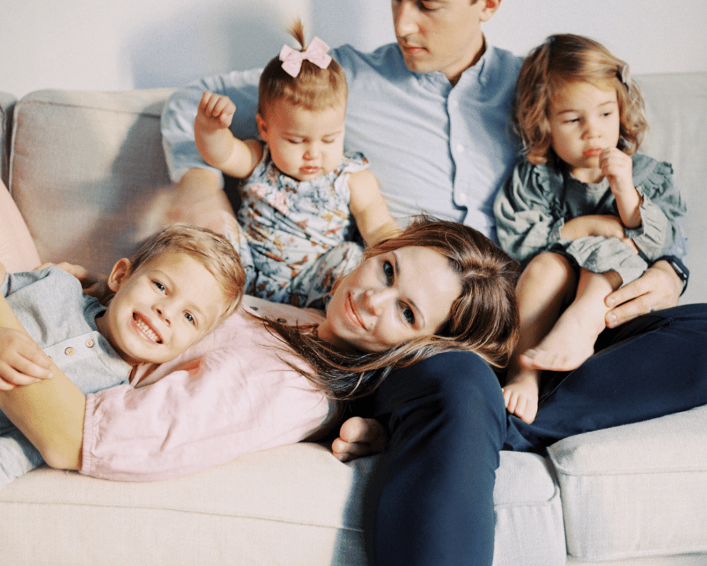 Jane with her family on the couch